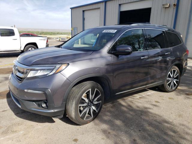 HONDA PILOT ELIT 2021 with VIN 5FNYF6H00MB017462 - Photo from auction