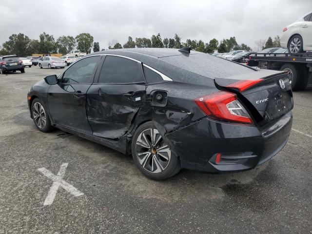 Photo 2 from auction – 2016 HONDA CIVIC EXL with VIN 2HGFC1F72GH659586