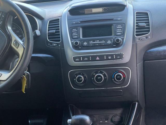 Photo 9 from auction – 2015 KIA SORENTO LX with VIN 5XYKT4A73FG590099