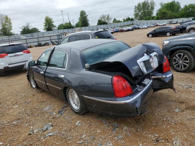 Photo 2 from auction – 2000 LINCOLN TOWN CAR E with VIN 1LNHM81W8YY918791