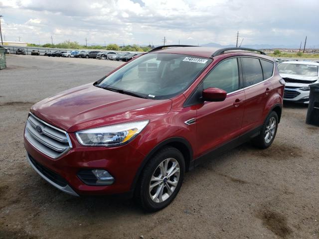FORD ESCAPE SE 2018 with VIN 1FMCU9GD5JUB82718 - Photo from auction