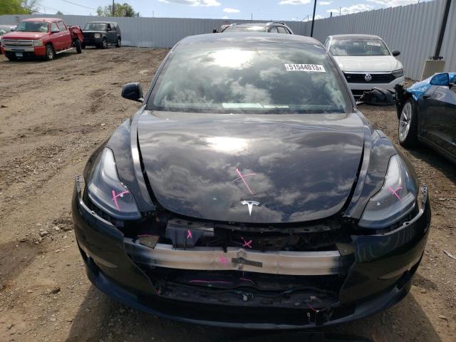 Photo 5 from auction – 2021 TESLA MODEL 3 with VIN 5YJ3E1EC2MF024783