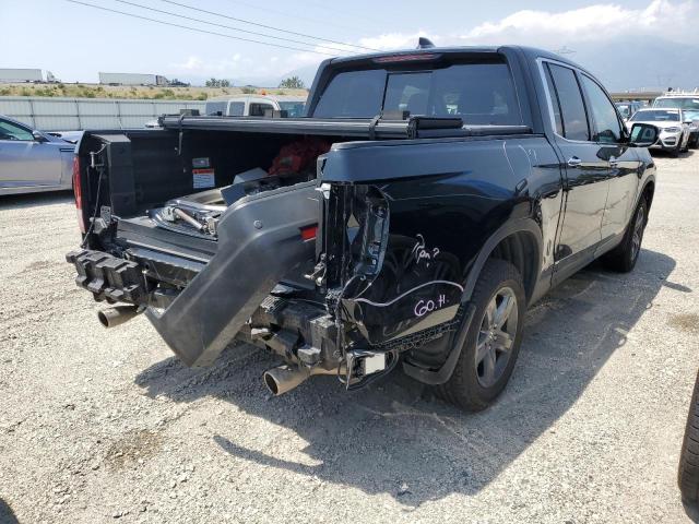Photo 3 from auction – 2022 HONDA RIDGELINE with VIN 5FPYK3F74NB032310