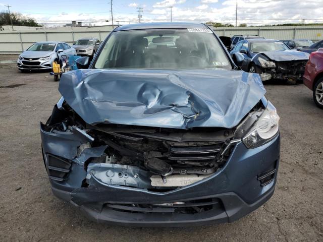 Photo 5 from auction – 2016 MAZDA CX-5 SPORT with VIN JM3KE2BY2G0889099