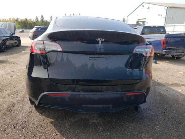 Photo 6 from auction – 2021 TESLA MODEL Y with VIN 5YJYGDEE2MF102613