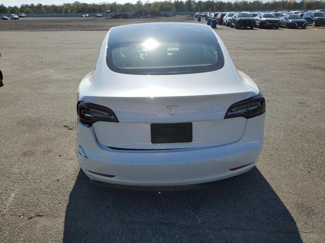 Photo 6 from auction – 2021 TESLA MODEL 3 with VIN 5YJ3E1EA7MF977861