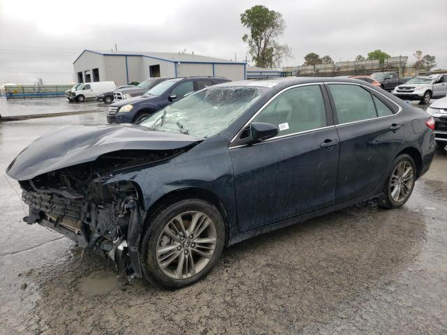 TOYOTA CAMRY LE 2017 with VIN 4T1BF1FKXHU665560 - Photo from auction