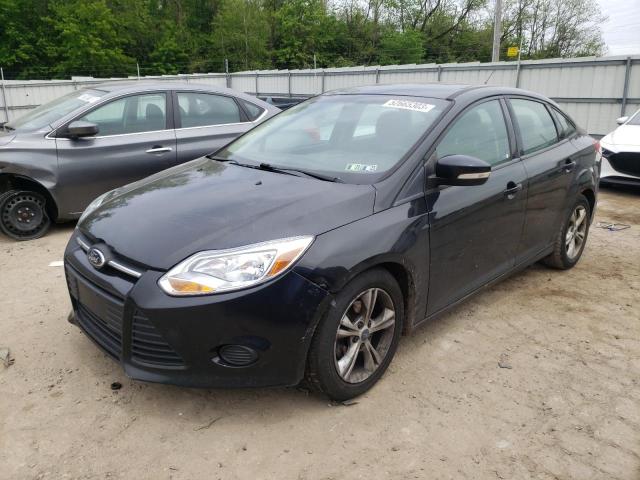 FORD FOCUS SE 2014 with VIN 1FADP3F24EL428317 - Photo from auction