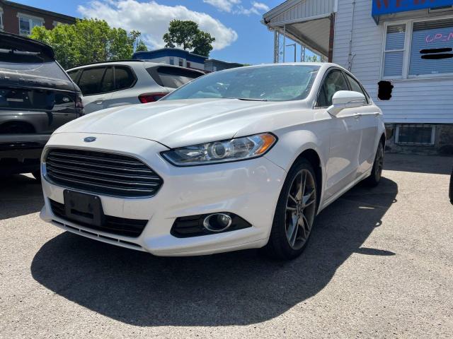 Photo 2 from auction – 2014 FORD FUSION TIT with VIN 3FA6P0D90ER384650