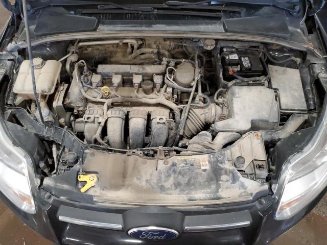 Photo 11 from auction – 2014 FORD FOCUS SE with VIN 1FADP3F22EL129926