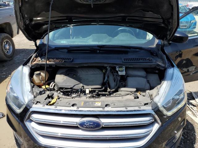 Photo 11 from auction – 2017 FORD ESCAPE SE with VIN 1FMCU9GD5HUC94347