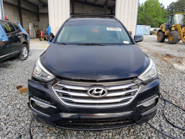 Photo 5 from auction – 2017 HYUNDAI SANTA FE S with VIN 5NMZU3LB0HH015457