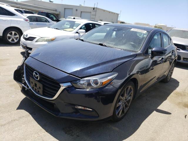 MAZDA 3 TOURING 2018 with VIN 3MZBN1L37JM185942 - Photo from auction