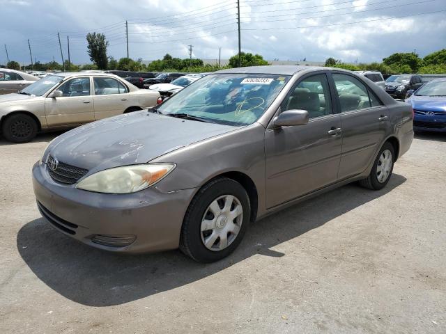 TOYOTA CAMRY LE 2002 with VIN 4T1BE32K42U553221 - Photo from auction