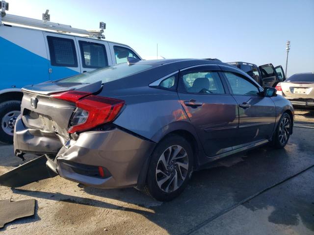 Photo 3 from auction – 2018 HONDA CIVIC EX with VIN 19XFC2F75JE015426