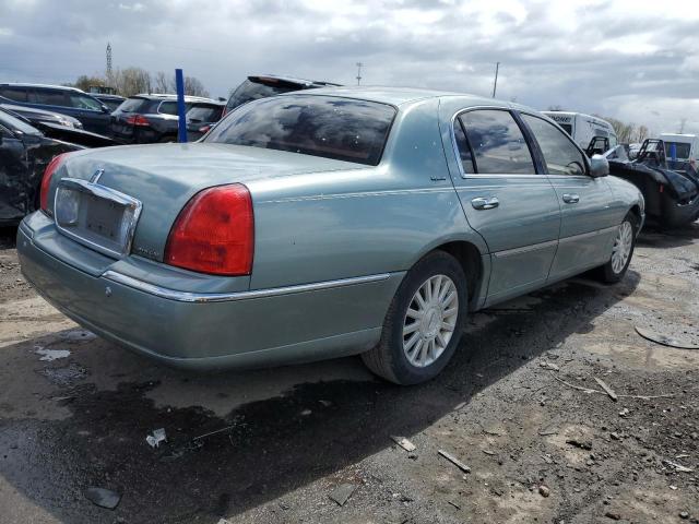 Photo 3 from auction – 2004 LINCOLN TOWN CAR E with VIN 1LNHM81W44Y640501