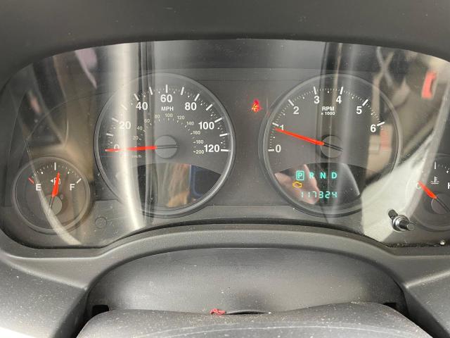 Photo 8 from auction – 2011 JEEP COMPASS SP with VIN 1J4NT1FA0BD252887