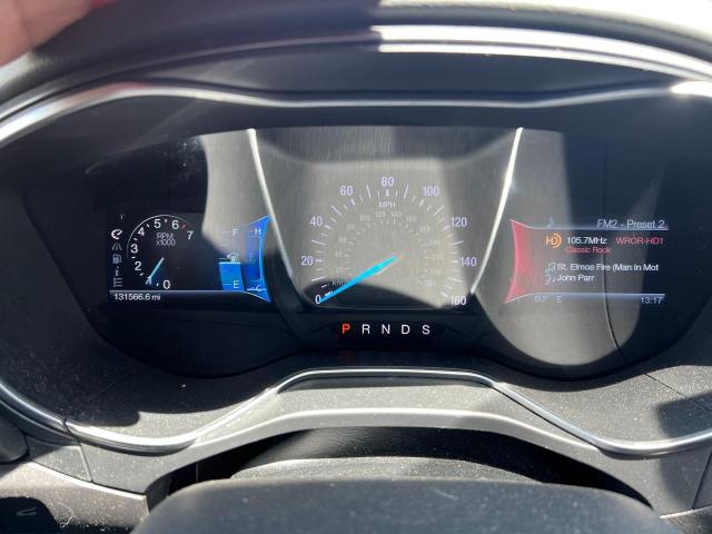 Photo 8 from auction – 2014 FORD FUSION TIT with VIN 3FA6P0D90ER384650