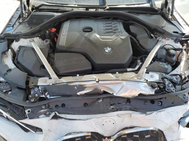 Photo 11 from auction – 2022 BMW 430I with VIN WBA23AT00NCJ49075