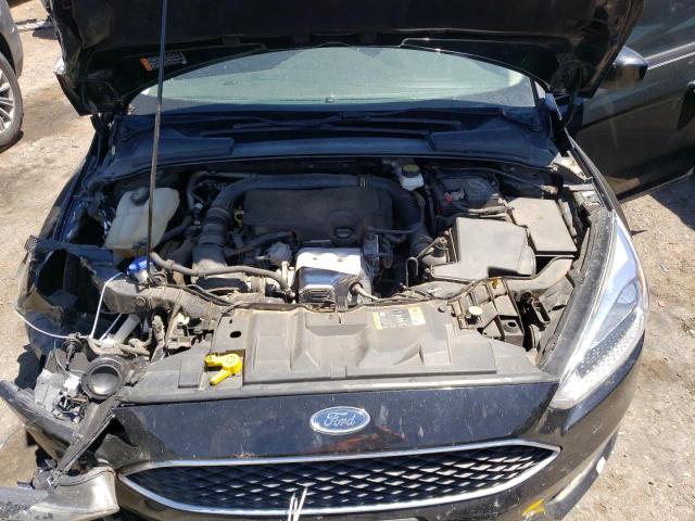 Photo 11 from auction – 2018 FORD FOCUS SE with VIN 1FADP3FE5JL244525