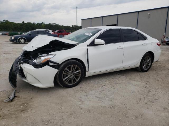 TOYOTA CAMRY LE 2017 with VIN 4T1BF1FK8HU779878 - Photo from auction