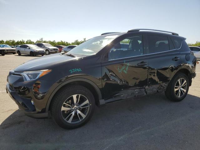 TOYOTA RAV4 XLE 2017 with VIN 2T3WFREV9HW387964 - Photo from auction