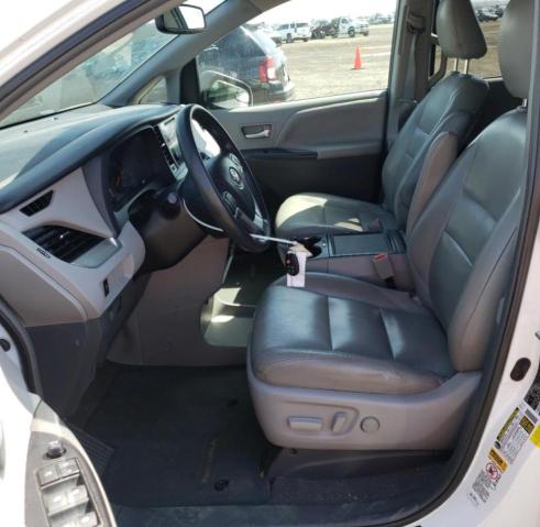 Photo 7 from auction – 2015 TOYOTA SIENNA LE with VIN 5TDKK3DCXFS614844