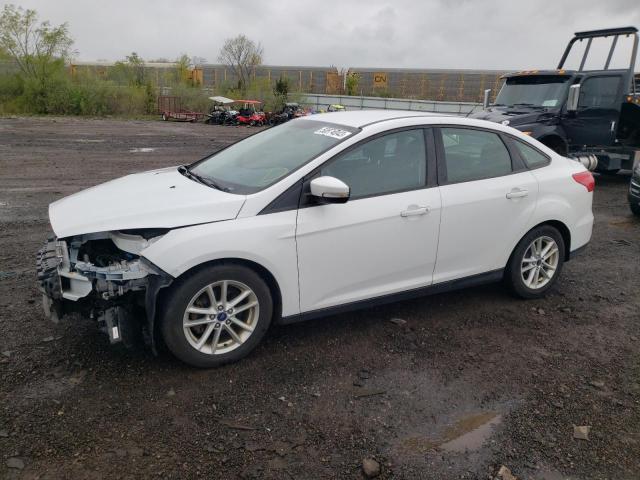 FORD FOCUS SE 2016 with VIN 1FADP3F21GL397868 - Photo from auction