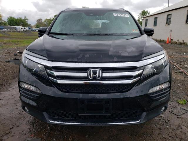 Photo 5 from auction – 2017 HONDA PILOT TOUR with VIN 5FNYF6H93HB043672