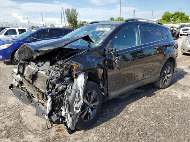 TOYOTA RAV4 XLE 2017 with VIN 2T3WFREV5HW351074 - Photo from auction