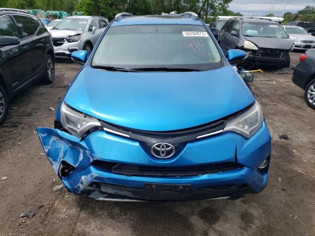 Photo 5 from auction – 2016 TOYOTA RAV4 XLE with VIN 2T3RFREV3GW438094