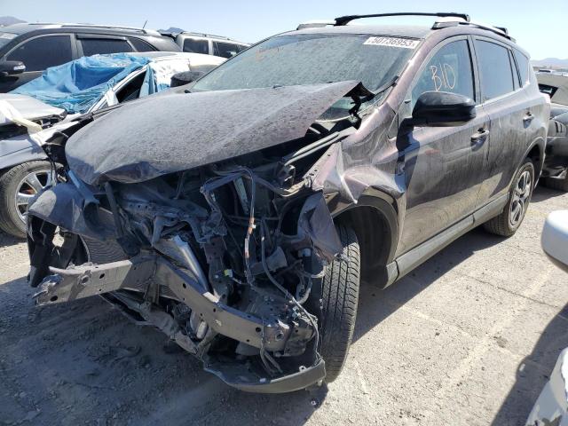 TOYOTA RAV4 LE 2018 with VIN 2T3ZFREV0JW513776 - Photo from auction