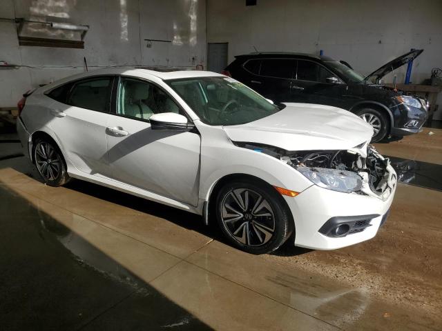 Photo 4 from auction – 2017 HONDA CIVIC EX with VIN 2HGFC1F39HH651421