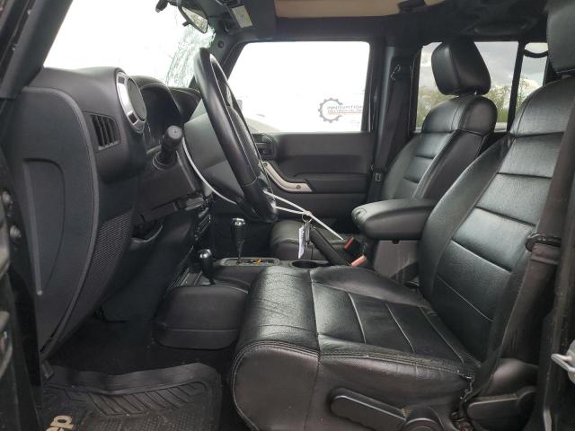 Photo 7 from auction – 2011 JEEP WRANGLER U with VIN 1J4HA5H14BL572873