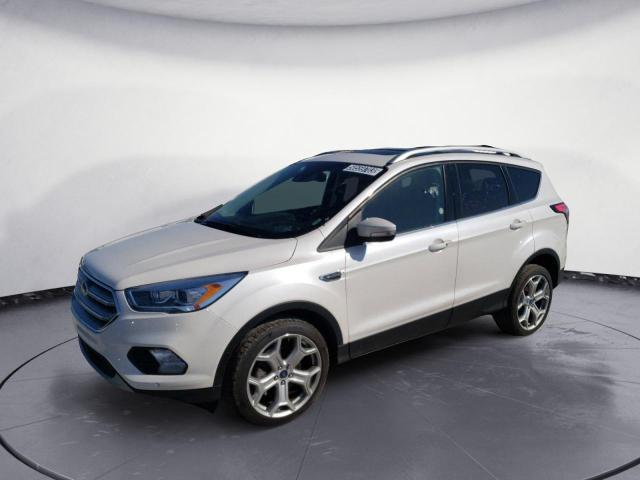 FORD ESCAPE TIT 2018 with VIN 1FMCU9J95JUC58894 - Photo from auction