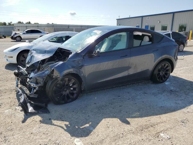 TESLA MODEL Y 2023 with VIN 7SAYGDEE4PA079002 - Photo from auction