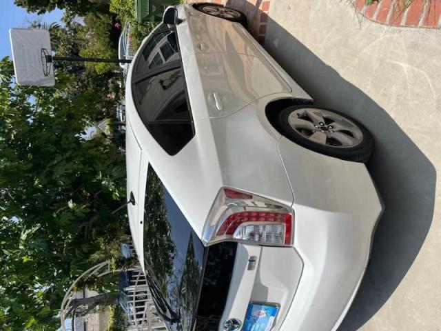 Photo 4 from auction – 2015 TOYOTA PRIUS with VIN JTDKN3DU8F424396