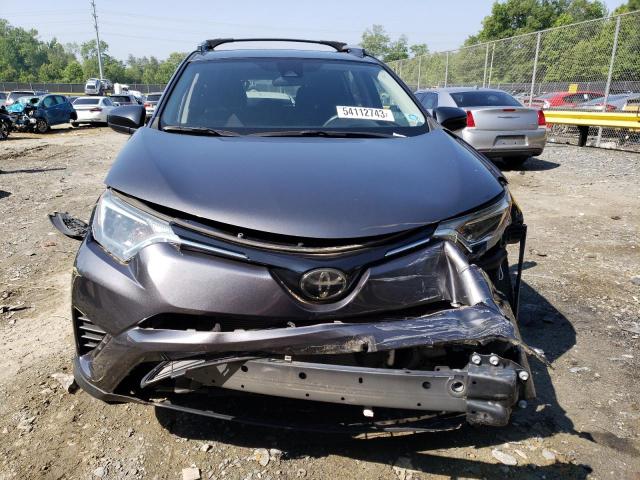 Photo 5 from auction – 2017 TOYOTA RAV4 LE with VIN JTMZFREV3HJ108620