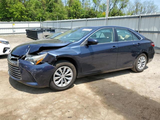 TOYOTA CAMRY LE 2017 with VIN 4T1BF1FK0HU636634 - Photo from auction