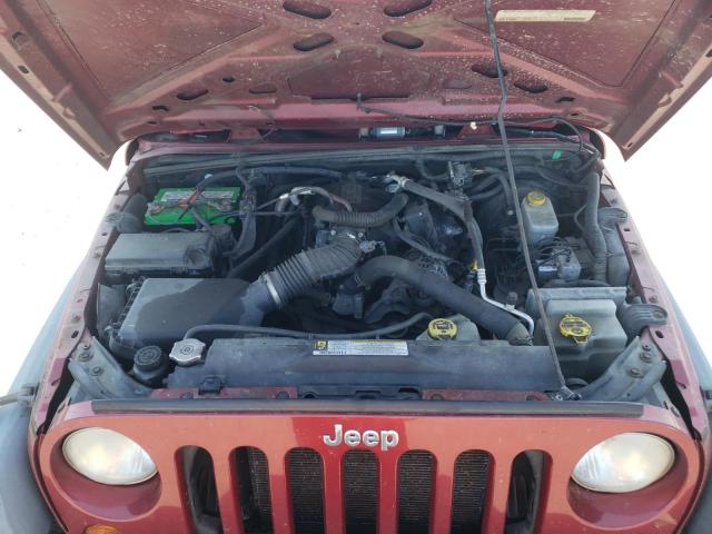 Photo 12 from auction – 2011 JEEP WRANGLER U with VIN 1J4BA3H11BL516643