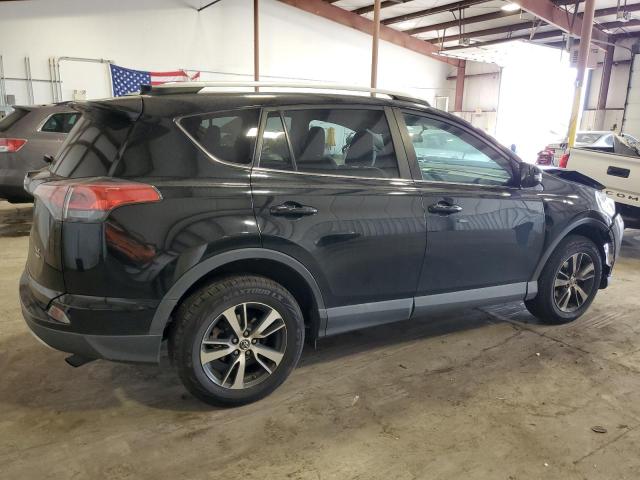Photo 3 from auction – 2016 TOYOTA RAV4 XLE with VIN 2T3RFREV6GW434458