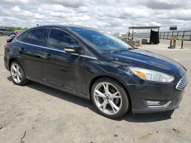 Photo 4 from auction – 2016 FORD FOCUS TITA with VIN 1FADP3J22GL282459