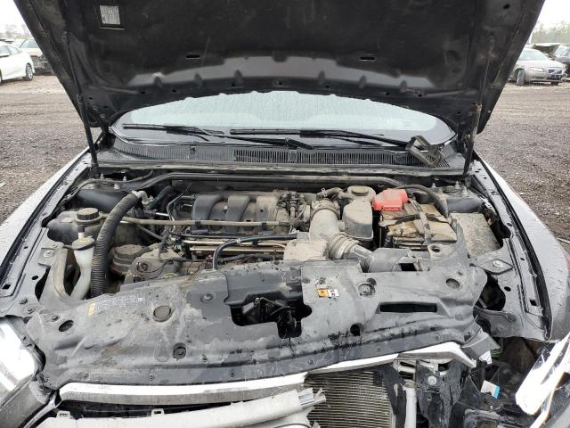 Photo 11 from auction – 2015 FORD TAURUS SEL with VIN 1FAHP2E87FG199272