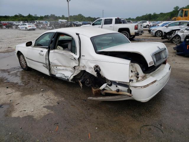 Photo 2 from auction – 2004 LINCOLN TOWN CAR E with VIN 1LNHM81W44Y629949