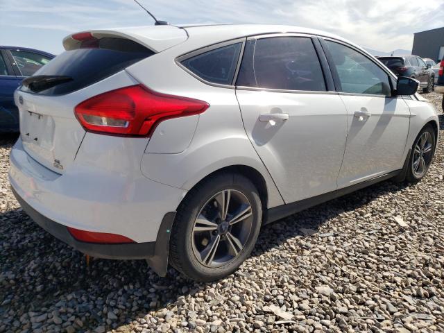 Foto 3 de la subasta – 2016 FORD FOCUS SE con VIN 1FADP3KEXGL275977