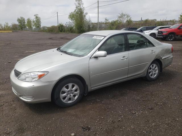 TOYOTA CAMRY LE 2003 with VIN JTDBF32K830128045 - Photo from auction