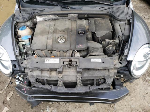 Photo 11 from auction – 2013 VOLKSWAGEN BEETLE with VIN 3VWFP7AT2DM671886