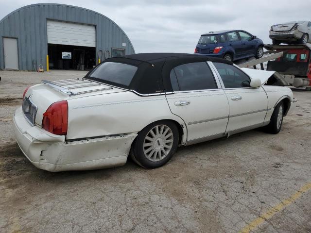 Photo 3 from auction – 2003 LINCOLN TOWN CAR E with VIN 1LNHM81WX3Y680077