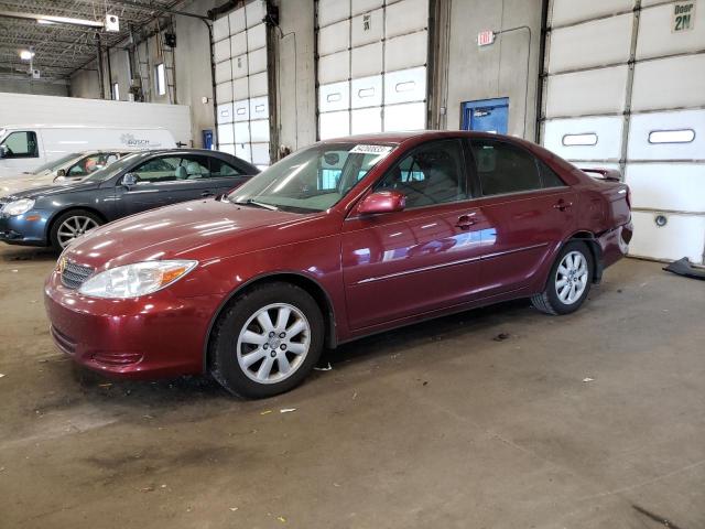 TOYOTA CAMRY LE 2002 with VIN 4T1BF30KX2U009824 - Photo from auction