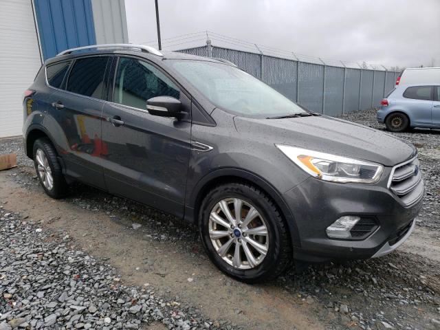 Photo 4 from auction – 2017 FORD ESCAPE TIT with VIN 1FMCU9J97HUD88573